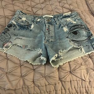 In EUC Zara Trafaluc graffiti shorts